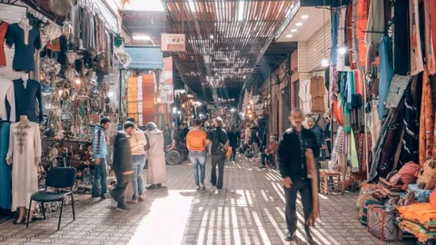 Hyper lapse walking through a crowded indoor market place in Marrakesh Stock Footage 107377777