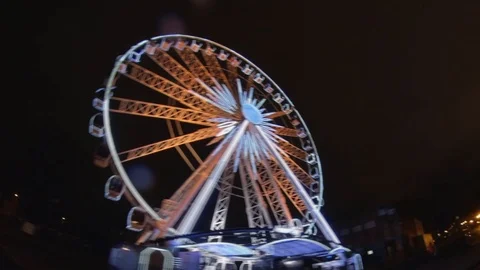 Hyper Lapse of White Ferris Wheel at Night Stock Footage 125007485