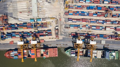 Hyper Time Lapse of aerial view of container ships and a port Stock Footage 103449775