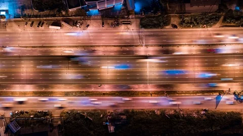 Hyper Time Lapse of Aerial View of Busy Highway Road Junctions at Night Stock Footage 103450170