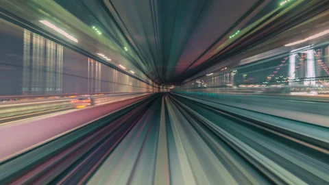 Hyper time-lapse of a Train moving through a futuristic neon city Stock Footage 168479285