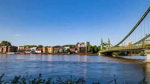 Hyper zoom timelapse view of the riverside village of Hammersmith in West London Stock Footage 91090085
