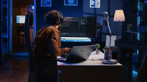 Hyperactive software developer suffering from adhd affliction, writing code Stockfoto's