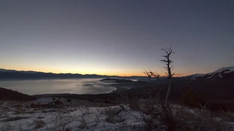 Hyperlaps shot, dawn over the mountain lake, in the snow-capped mountains Stock Footage 85385933