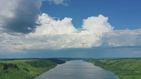 Hyperlapse above wide river between green mountains Stock Footage 160222925