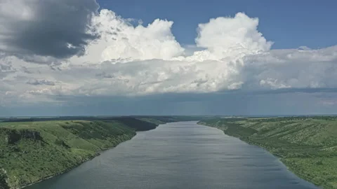 Hyperlapse above wide river between green mountains Stock Footage 160222935