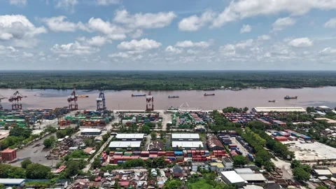 Hyperlapse of activity at the port with ship activity and cloud movement Stock Footage 336079540