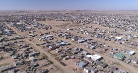 Hyperlapse aerial flight over dry African town Stock Footage 111963878