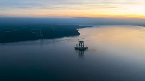 Hyperlapse Aerial View of Chacao Bridge Central Pillar at Sunset, Chile Stock Footage 345009526