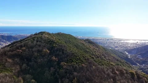Hyperlapse of an aerial view from a drone flying over the hills of Genoa Stock Footage 327678055