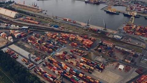 Hyperlapse aerial view of a high-tech working seaport accepts and ships goods Stock Footage 113191081