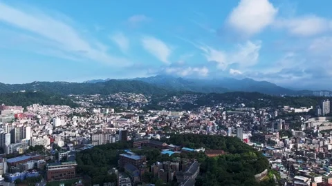 Hyperlapse Aerial View of Naksan Park and Downtown Seoul, South Korea Stock Footage 324769377