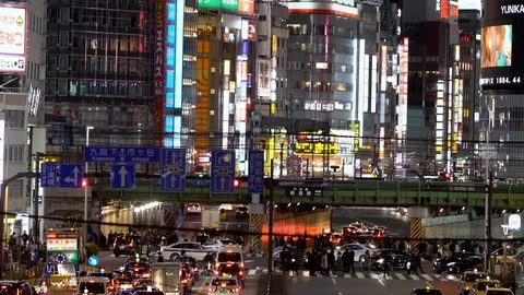 Hyperlapse aerial view people crossing street with traffic cars driving.-Dan Stock Footage 125499408