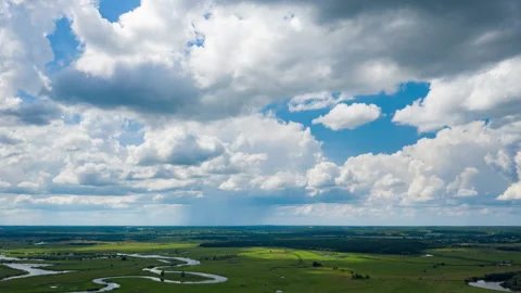 Hyperlapse aerial view of a summer landscape and summer cloudy skies. Stock Footage 160363471