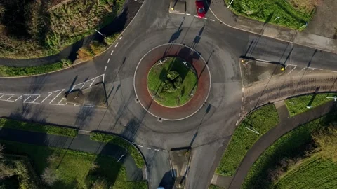 Hyperlapse aerial view of traffic flowing smoothly through a busy top down Stock Footage 332374069