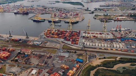 Hyperlapse aerial view of a well-equipped modern seaport accepts cargo Stock Footage 113191023