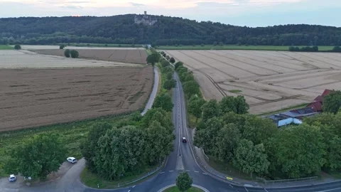 Hyperlapse along a country road toward Marienburg Castle in Germany Stock Footage 340159229