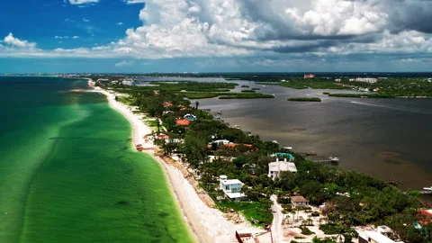 Hyperlapse Along Osprey Sand Beach and Coastal Lagoon on Cloudy Day Stock Footage 343438840