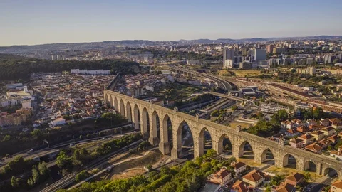 [Hyperlapse] Aqueduct and road traffic in Lisbon, Portugal, 4k aerial skyline  Stock Footage