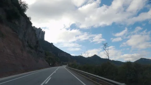 Hyperlapse Backwards reverse drive on mountain road Stock Footage 123358000