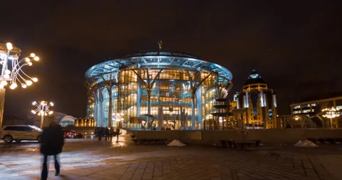Hyperlapse of the beautiful, modern building, decorated with night illumination Stockbeeldmateriaal 248001859