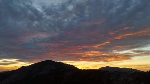 Hyperlapse Blue Pink Sunset Clouds Puerto de Navacerrada Madrid Spain 動画素材 338110613