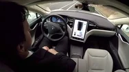 Hyperlapse: Businessman In Tesla Model S Car With Self-Steering Autopilot On Stock Footage