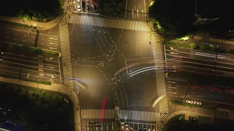 Hyperlapse of busy intersection in China at night with cars and traffic creating Stock-Footage 318644853