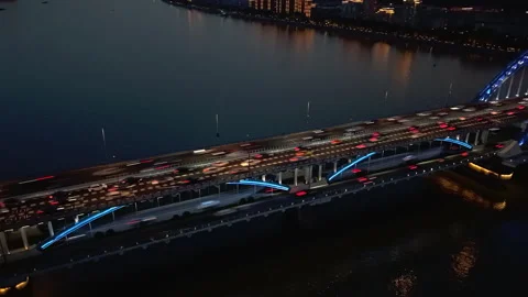 A hyperlapse captures the busy traffic on a bridge in Hangzhou at night Stock Footage 340904106