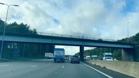 Hyperlapse car driving pov on M62 motorway in Manchester on cloudy day Stock Footage 262145602
