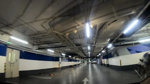 Hyperlapse: car moving in the indoor parking lot Stock Footage 96048934