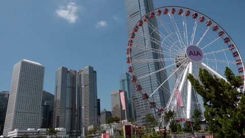 Hyperlapse of the city skyscraper and the ferry wheel. Hong Kong Stock Footage 102313472