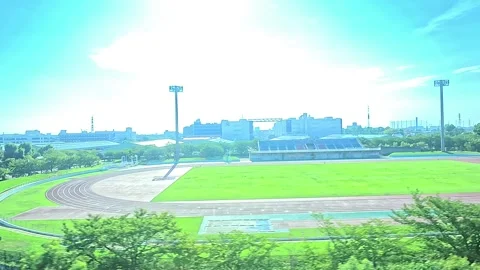 A hyperlapse of cityscape by side view of a moving urban monorail in Tokyo Stock Footage 331791435