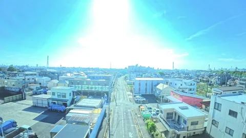 A hyperlapse of cityscape by side view of a moving urban monorail in Tokyo Stock Footage 331791436