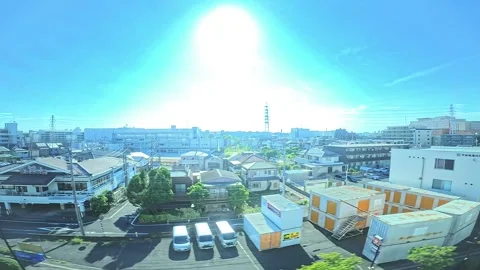 A hyperlapse of cityscape by side view of a moving urban monorail in Tokyo Stock Footage 331791440