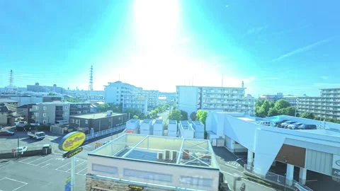 A hyperlapse of cityscape by side view of a moving urban monorail in Tokyo Stock Footage 331791446