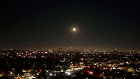 Hyperlapse Downtown Los Angeles Skyline with Full Moon at Night Vídeo Stock 313347448