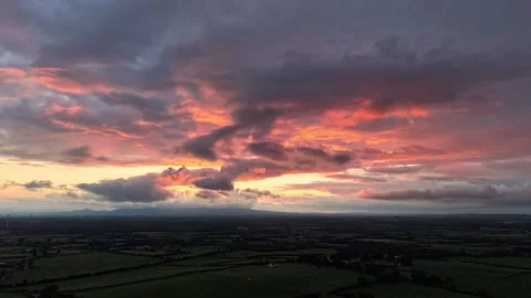 Hyperlapse of Dramatic Colorful Sunset Clouds Over Countryside 動画素材 344004593