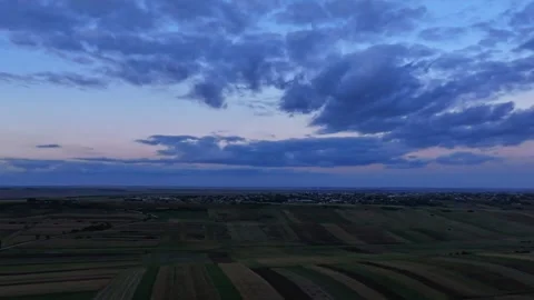 Hyperlapse of drifting clouds, flyover agricultural fields in east Romania Stock Footage 331185417