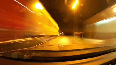 Hyperlapse drivelapse footage from car dashcam pov while driving at night in Vídeos de archivo 164468628