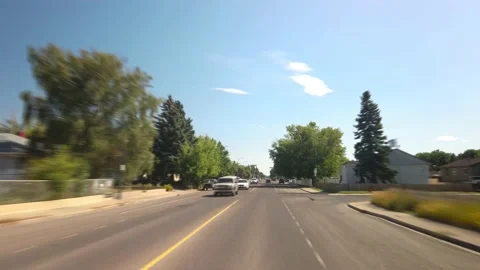 Hyperlapse driving across Lethbridge in Alberta during sunny summer day Video stock 146650745