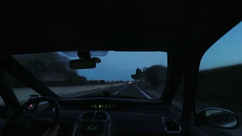 Hyperlapse Driving a car at dusk with blur effect and stripes of light Stock Footage 98568352