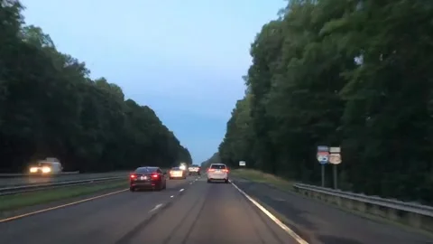 HYPERLAPSE- DRIVING DOWN THE INTERSTATE AT SUNSET Stock Footage 130729676