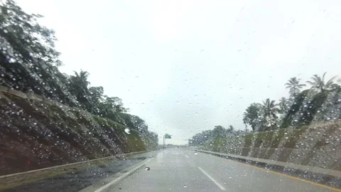 HYPERLAPSE Driving Through Heavy Rain at Trans Solo Salatiga Semarang Toll Road Stock Footage 129456514