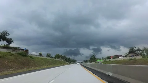 HYPERLAPSE Driving Through Heavy Rain at Trans Solo Salatiga Semarang Toll Road Stock Footage 129460492
