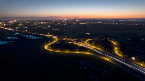 Hyperlapse drone above the traffic, during a sunset Stock Footage 244971026