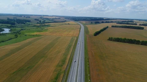 Hyperlapse drone flies over the highway, cars are driving Stockbeeldmateriaal 117959329