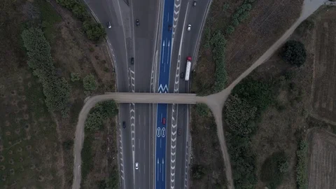 Hyperlapse of drone flight over toll with orange booths in highway Stock Footage 94833409