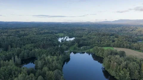 Hyperlapse drone fly over forest lakes at sunset Ecromagny Voges region France Stock Footage 160565906