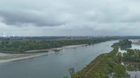 Hyperlapse drone sequence follows a rowing team training on the Po River, with Video stock 323870167